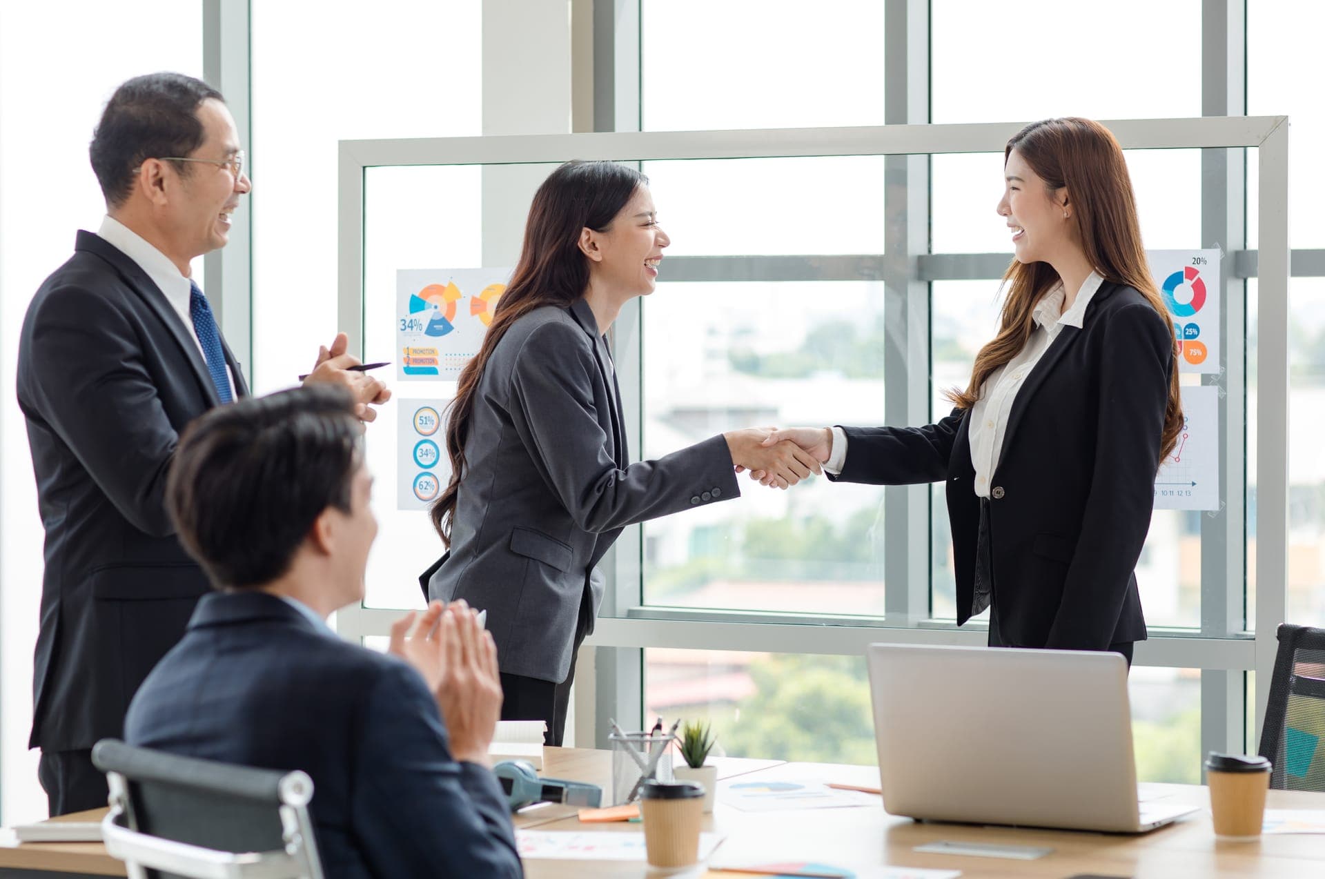 Business professionals discussing partnership strategy